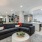 a large room with a couch and a coffee table