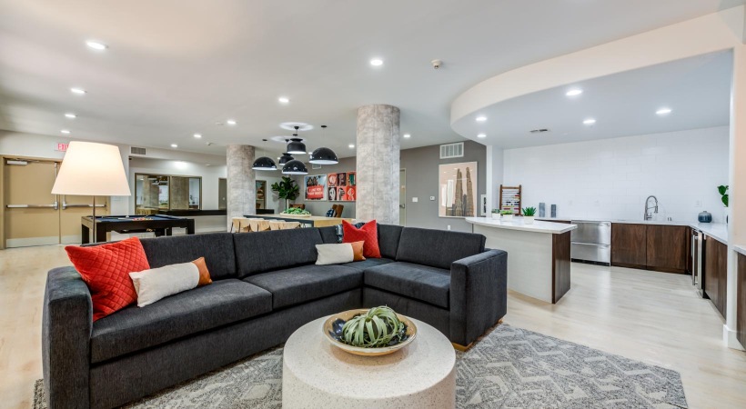 a large room with a couch and a coffee table