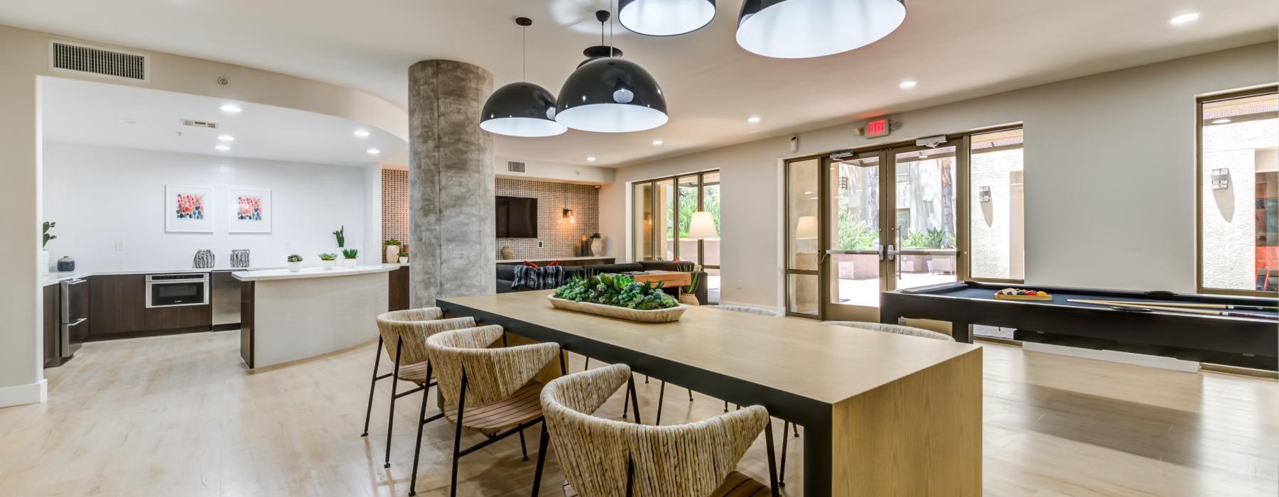 resident kitchen with pool table and seating island