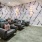movie room with chairs and a projection screen