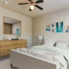 bedroom with a dresser and ceiling fan