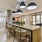 resident kitchen with pool table and seating island