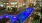 aerial view of a swimming pool at night in a courtyard