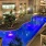 aerial view of a swimming pool at night in a courtyard
