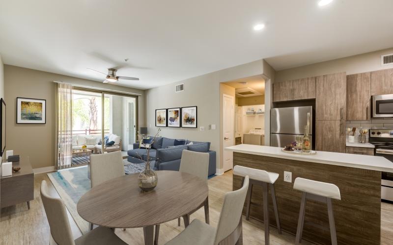 a large kitchen with a dining table